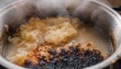© Happy - Overboiled pasta turned mushy and burnt at bottom.