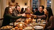 © Felippe Lopes - Friends and family celebrating Thanksgiving dinner toasting with red wine around a festive table with turkey and side dishes