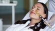 © Home-stock - Happy woman enjoying soothing facial skincare treatment as beauty specialist applying nourishing cosmetic mask in modern wellness salon, panorama, free space