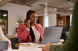 © Rido - Black customer service woman on call with big smile