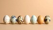 © RazaA - Five eggs in horizontal line with varied colors and patterns, symbolizing natural diversity and organic texture.