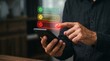 © B TEC  - Customer selecting negative feedback on smartphone