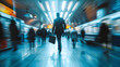 © Winston - Man walking briskly through train station with briefcase amid motion blurred crowd