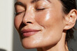 © JoeyMarut - Glowing skin close up portrait natural makeup middle aged woman serene expression soft sunlight