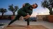 © MI coco - Man practicing yoga on a balcony at sunset