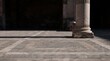 © Cosmic - Classical stone column base on a geometric paved floor with deep sunlight shadows