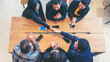 © aFotostock - Top view of MultiEthnics Teamwork high five hands stack shakehand together. Collaboration Team Meeting in Conference Room. Diversity Partner Business Meeting brainstorm hand holding teamwork consult