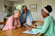 © Pete - Mature interracial couple sit at table with financial advisor. Happy seniors smile discussing retirement plans with black woman expert. Group looks at tablet screen showing data charts in home