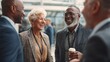 © basilia - Diverse group of businesspeople laughing and talking