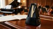 © Bane - Classic mechanical metronome on a wooden piano with music score in a hall