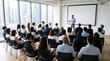 © InoStudiox - Présentation professionnelle devant un public dans une salle de conférence