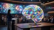 © Hryhor Denys - Businesswoman presenting neurodiversity concept with colorful brain model. Diverse audience listening in modern inclusive coworking space.