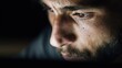 © Yusuf - Close up of a mans face in darkness with dramatic lighting