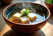 © Yaroslava - Miso Soup Scenic Presentation Smooth Tofu Deep Savory Seaweed Wooden Bowl Essence Harmony