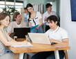 © JackF - Several managers work together in a modern office. A well-coordinated management team