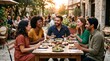 © PSCREATIVE - Diverse group of friends enjoying a meal together at an outdoor restaurant