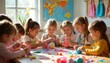 © miss irine - Young children work together on art project at table. Kids create fabric bags, learn crafting skills, develop imagination in bright classroom. Group enjoys creative hobby time.