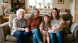 © Felippe Lopes - Multi generational family enjoying time together on a sofa, smiling and laughing