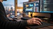 © JENO - Person typing on computer keyboard in front of dual monitors with cityscape
