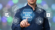 © DEAR KHALA - Man pointing to patient data privacy and corporate medical security network icon