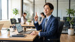 © Zangi_Studio - A young Japanese businessman in his 30s having a bright idea and pointing up at his office desk