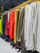 © Harmony Video Pro - Colorful hooded sweatshirts hanging neatly on racks inside a sporting goods store present a bright and comfortable selection of casual sportswear for everyday use