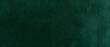 © Vexello - Green texture background featuring a richly grained deep emerald surface with soft brush strokes and subtle shading for elegant designs