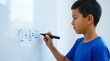© Tapasii - A male student solving math problems on a whiteboard, tagged as a NO NAME file, for individual academic focus visuals.