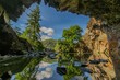 © robertharding - Enjoying views from Rydal Cave in the Lake District while hiking through beautiful nature in Cumbria, UK on a clear day