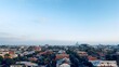 © Kenneth - High angle panorama of a leafy green suburb in Melbourne stretching toward the distant metropolitan city skyline