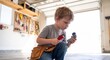 © mtmakos - Little Boy Pretending to be a Plumber with Tools