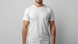 © AbdurRazzak - Man wearing a white tshirt on a light gray background for mockup purposes