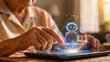 © rungnapha - Elderly person engages with tablet, showcasing digital tutor assisting in learning, highlighting joy of education through technology