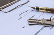 © Kamitana - Loan Agreement with House Keys and Fountain Pen for Mortgage and Lending Concept