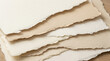 © Biddut-Art - Stack of rough edged handmade paper on wood table