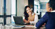 © peopleimages.com - Laptop, discussion and business women in office for finance report with budget planning in collaboration. Computer, happy and financial advisor with investor for investment proposal in workplace.