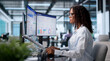 © Andrey Popov - Young Sales Manager Reviews Client Data Using Laptop