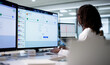 © Andrey Popov - Young African American Woman Analyzes Medical Billing Data