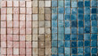 © J.V. Visuals Studio - A neat grid of small handmade ceramic tiles, each showing a unique glaze texture