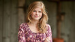 © Mrammon - Young woman casual portrait smiling blonde hair floral blouse natural light countryside outdoor relaxed confident female youth teenager millennial long hair looking camera standing wooden