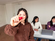 © ADDICTIVE STOCK - Adult Japanese language lesson in classroom with teacher