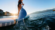 © Marko/Stocksy - Detail of paddle with splash of water