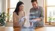 © Rendara Studio - Two diverse colleagues shaping floating holographic concept web at warm studio table
