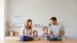© velikiyzayats - Happy Caucasian family with young son and daughter preparing school lunch boxes and backpacks in a modern kitchen for morning routine and education preparation