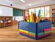 © Jbx - Organizer with Colorful Pens and Pencils on Classroom Desk.