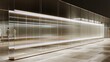 © wilson - Long empty modern glass display wall with warm led lighting in luxury boutique store interior perfect for high end product presentation