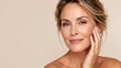 © Aleksandr - Beautiful Mature Woman Touching Healthy Glowing Skin with Natural Anti Aging Beauty Care