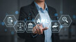 © Anjana444 - Businessman pointing at AML anti money laundering compliance concept virtual screen
