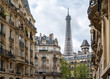 © Westend61 - Eiffel Tower behind residential buildings in Paris, France