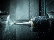 © Westend61 - CNC machine drilling with coolant